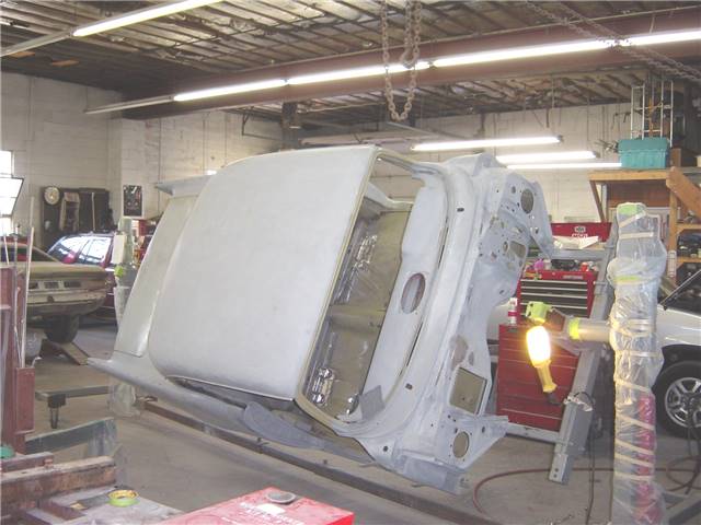 Exterior body work being performed.